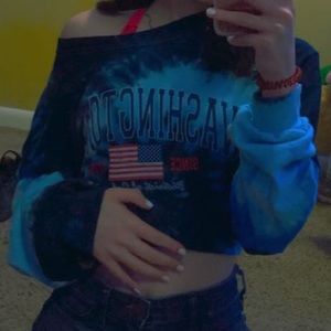 in the picture i have it tied up but normally it goes past my hips.